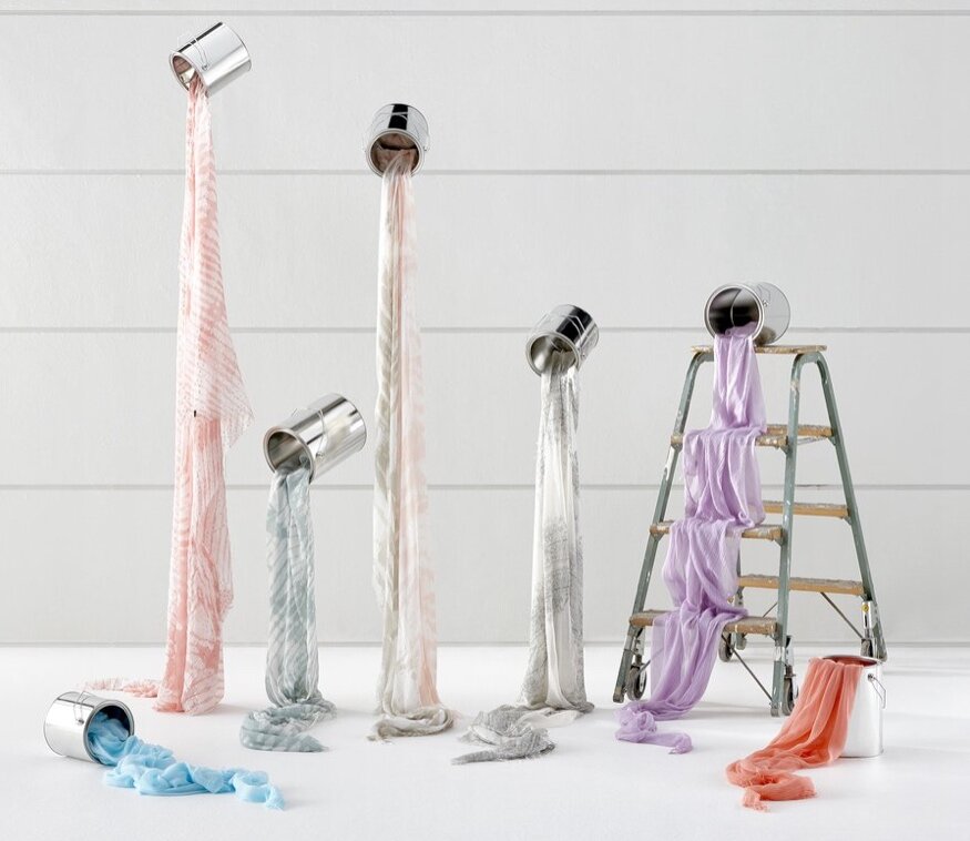 Repeat Cashmere styled product photograph with paint cans and fabric