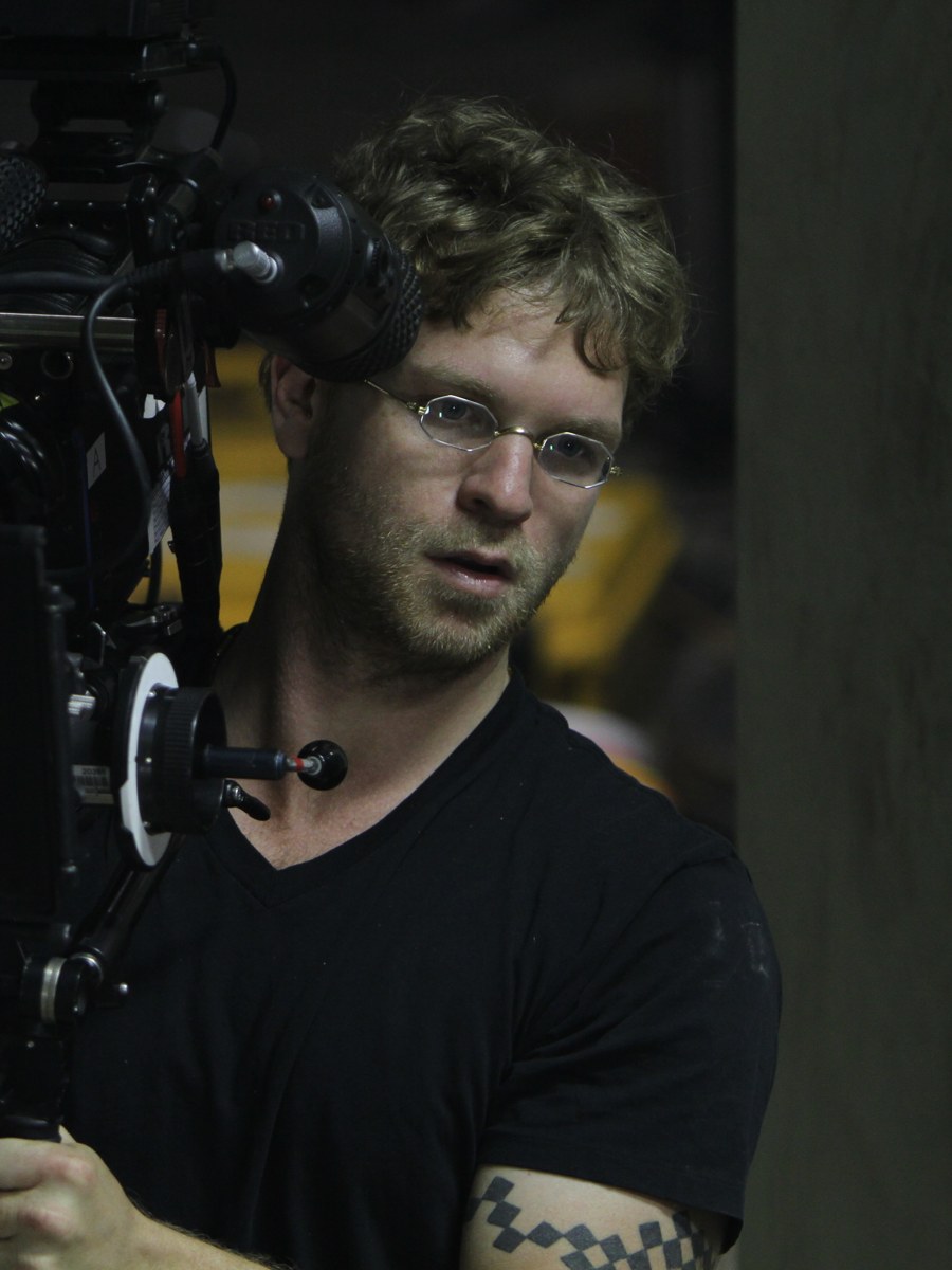 Michael Regalbuto on set operating a camera rig